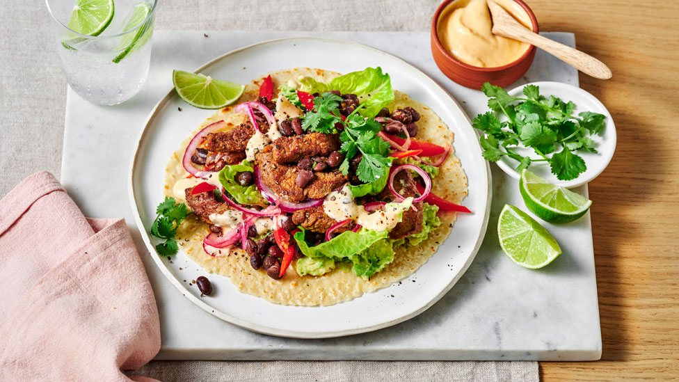 high-protein-beef-wrap-with-black-beans-salad-leaves-and-creamy-sauce